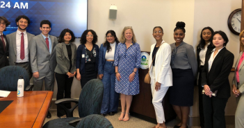 IDEAL and REAL students meeting with Vicki Arroyo, associate administrator for policy at the United States Environmental Protection Agency. All dressed in professional attire.