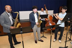 A jazz band featuring students and faculty played in Pope Auditorium.