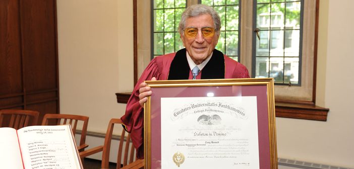 Tony Bennett holding his honorary degree