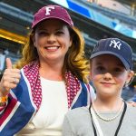 Tania Tetlow standing with her daughter at Yankee Stadium