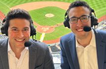 Two people in a broadcast booth