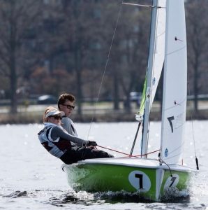 Members of the co-ed sailing team in a competition at MIT