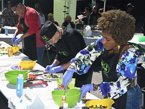 Participants preparing healthy dishes in the Fresh Chef Contest at last year's Harvest Fair.
