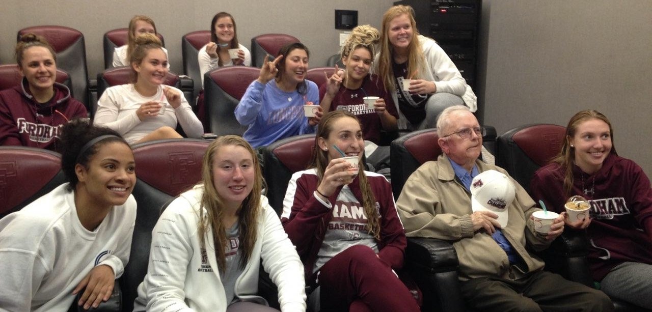Leo Daly and the women's basketball team eating frozen yogurt together