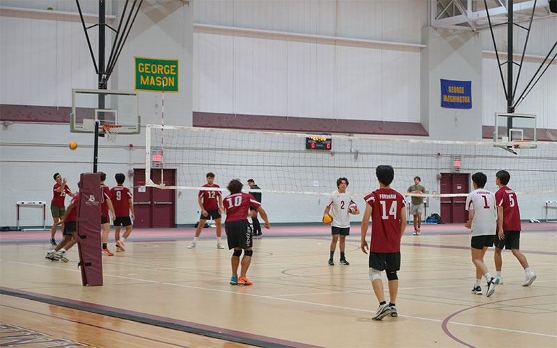The men's Club Volleyball team practices for an upcoming tournament 