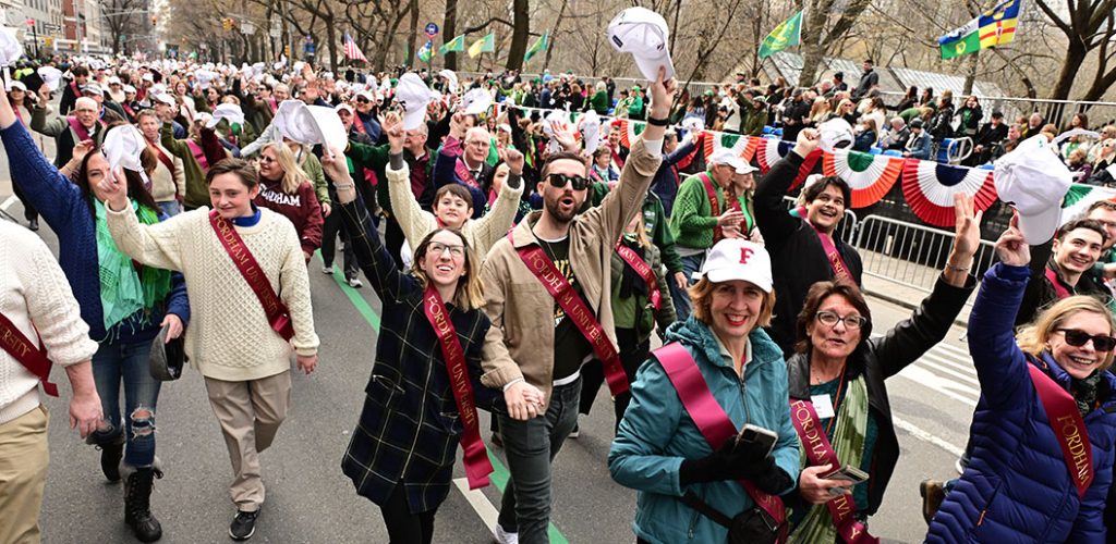 Fordham community marching in St. Patricks Day Parade.